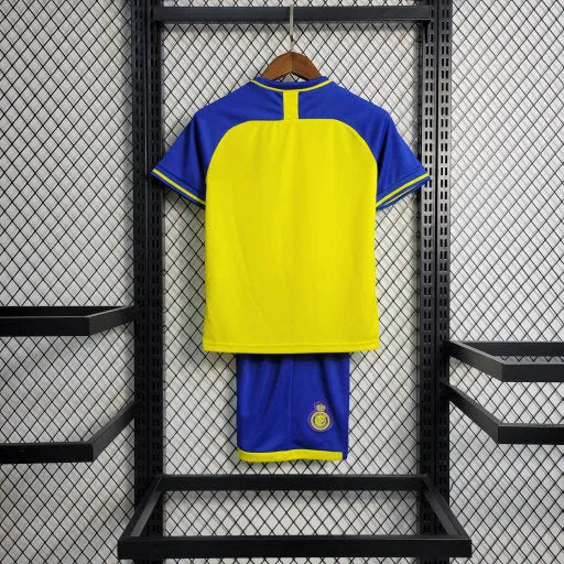 Camisa Al-Nassr Home 23/24 - Torcedor Infantil Azul e Amarela - Camisa de Time Oficial - Buyit