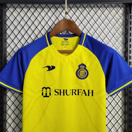 Camisa Al-Nassr Home 23/24 - Torcedor Infantil Azul e Amarela - Camisa de Time Oficial - Buyit