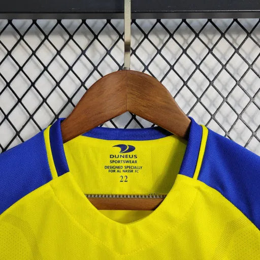 Camisa Al-Nassr Home 23/24 - Torcedor Infantil Azul e Amarela - Camisa de Time Oficial - Buyit