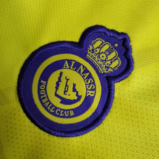 Camisa Al-Nassr Home 23/24 - Torcedor Infantil Azul e Amarela - Camisa de Time Oficial - Buyit